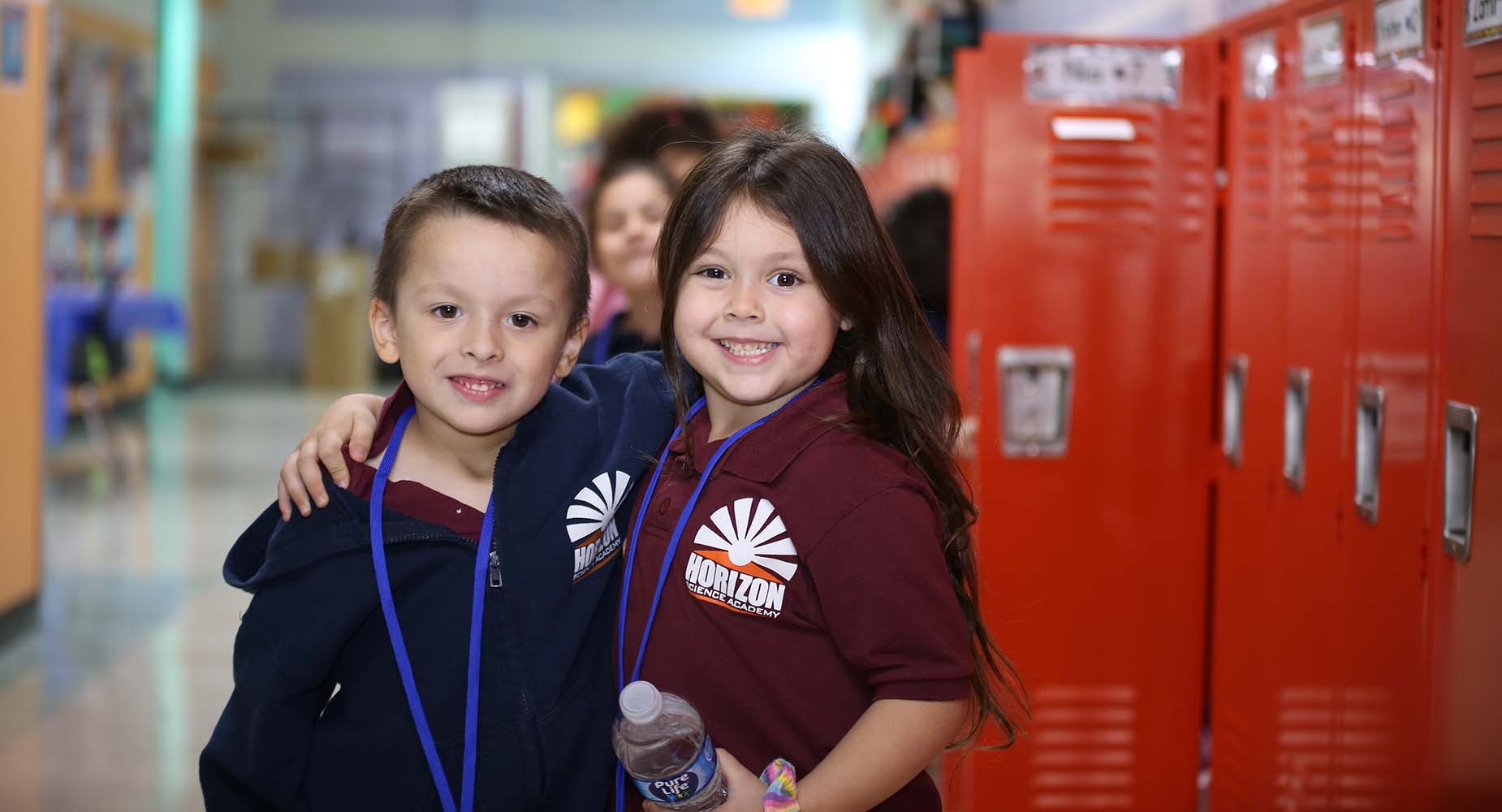 Teacher helping student
